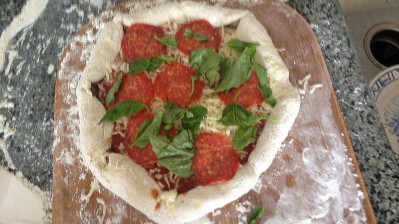 Illustration for article titled How To Make Your Own Damn Hot Dog Stuffed Crust Pizza Right Now
